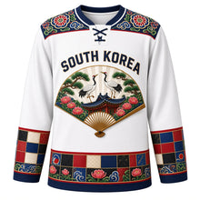 Load image into Gallery viewer, South Korea Original Hockey Jersey in Hanji White, front view – dancheong yoke and folding-fan crane and mugunghwa crest with ornate detailed artwork, custom name and number
