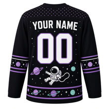 Load image into Gallery viewer, Spacewalk Explorer Original Hockey Jersey in Cosmic Black, back view with your name and number – star-pattern yoke and orbit-ring sleeve bands