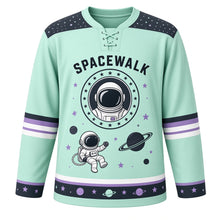 Load image into Gallery viewer, Spacewalk Explorer Original Hockey Jersey in Orbit Mint, front view – floating astronaut on a tether with ringed planet and astronaut-helmet crest, custom name and number