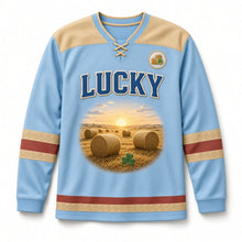 Load image into Gallery viewer, Hay Meadow Bales St. Patrick's Day Hockey Jersey in Hay Sky Blue, front view – custom name and number