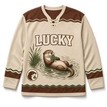Load image into Gallery viewer, Riverbank Otter St. Patrick's Day Hockey Jersey in Otter Oatmeal, front view – custom name and number
