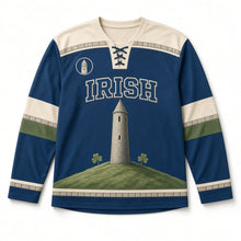 Load image into Gallery viewer, Round Tower St. Patrick's Day Hockey Jersey in Tower Dusk Blue, front view – custom name and number