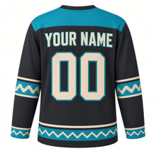 Load image into Gallery viewer, Sun Stone Geometric Original Hockey Jersey in Basalt Turquoise, back view with your name and number – stepped-diamond yoke and zigzag diamond hem stripes