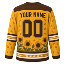 Load image into Gallery viewer, Sunflower Fields Original Hockey Jersey in Sunflower Gold, back view with your name and number – seed-dot yoke and petal-chevron sleeve stripes