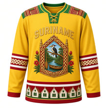 Load image into Gallery viewer, Suriname Original Hockey Jersey in Kiskadee Yellow, front view – ornate gabled tembe-carved crest with rainforest canoe, kiskadee and faya lobi flowers, pangi yoke, detailed artwork, custom name and number