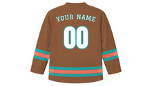 Load image into Gallery viewer, Suva Original Hockey Jersey in Tapa Brown, back view with your name and number