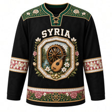 Load image into Gallery viewer, Syria Original Hockey Jersey in Basalt Black, front view – ornate octagonal inlay medallion with Hama water wheel, oud and Damascene roses, detailed artwork, custom name and number