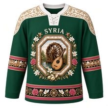 Load image into Gallery viewer, Syria Original Hockey Jersey in Damask Green, front view – ornate octagonal inlay medallion with Hama water wheel, oud and Damascene roses, detailed artwork, custom name and number
