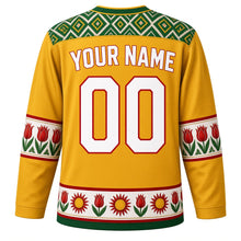 Load image into Gallery viewer, Tajikistan Original Hockey Jersey in Atlas Gold, back view with your name and number – atlas ikat silk yoke and chakan tulip sleeve bands