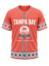 Load image into Gallery viewer, Tampa Bay Original Baseball Jersey in Coral, front view – coral body with white and teal piping, Ybor City-style mosaic tile trim, Gulf sunset palm emblem and a ST. PETERSBURG • CLEARWATER • YBOR CITY city line – custom name and number