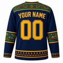 Load image into Gallery viewer, Tanzania Original Hockey Jersey in Zanzibar Blue, back view with your name and number – kanga-border yoke and Tingatinga bird sleeve bands