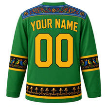 Load image into Gallery viewer, Tanzania Original Hockey Jersey in Serengeti Green, back view with your name and number – kanga-border yoke and Tingatinga bird sleeve bands