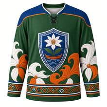Load image into Gallery viewer, Te Maeva Nui Original Hockey Jersey in Reef Green, front view with themed artwork and clean crest