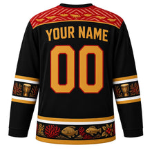 Load image into Gallery viewer, Timor-Leste Original Hockey Jersey in Ikat Black, back view with your name and number – tais ikat-weave yoke and babadok drum sleeve bands
