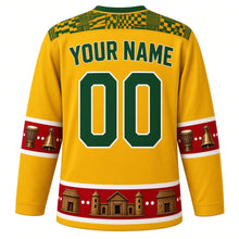 Load image into Gallery viewer, Togo Original Hockey Jersey in Savanna Gold, back view with your name and number – Ewe kente strip-weave yoke and agbadza drum sleeve bands