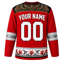 Load image into Gallery viewer, Trinidad and Tobago Original Hockey Jersey in Ibis Scarlet, back view with your name and number – carnival mas plumage yoke and steelpan note sleeve bands