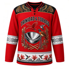 Load image into Gallery viewer, Trinidad and Tobago Original Hockey Jersey in Ibis Scarlet, front view – ornate steelpan crest with scarlet ibis, cocrico and chaconia, carnival-plumage yoke, detailed artwork, custom name and number