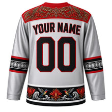 Load image into Gallery viewer, Trinidad and Tobago Original Hockey Jersey in Chrome Pan Silver, back view with your name and number – carnival mas plumage yoke and steelpan note sleeve bands