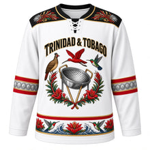 Load image into Gallery viewer, Trinidad and Tobago Original Hockey Jersey in Mas White, front view – ornate steelpan crest with scarlet ibis, cocrico and chaconia, carnival-plumage yoke, detailed artwork, custom name and number