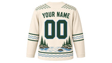 Load image into Gallery viewer, Trout Stream Angler Original Hockey Jersey in Birch Cream, back view with your name and number – river-pebble yoke and fishing-line sleeve bands