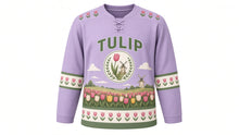 Load image into Gallery viewer, Tulip Windmill Fields Original Hockey Jersey in Dusk Lilac, front view – rows of tulips and a windmill on the horizon with tulip crest, custom name and number