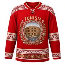 Load image into Gallery viewer, Tunisia Original Hockey Jersey in Carthage Red, front view – ornate Roman mosaic plaque crest with El Jem amphitheatre, jasmine and olive branch, detailed artwork, custom name and number
