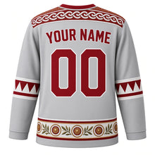 Load image into Gallery viewer, Tunisia Original Hockey Jersey in Olive Silver, back view with your name and number – Roman mosaic yoke and Sejnane pottery sleeve bands