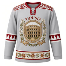Load image into Gallery viewer, Tunisia Original Hockey Jersey in Olive Silver, front view – ornate Roman mosaic plaque crest with El Jem amphitheatre, jasmine and olive branch, detailed artwork, custom name and number