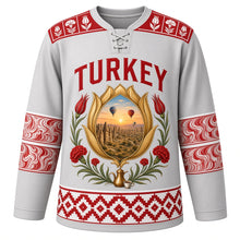 Load image into Gallery viewer, Turkey Original Hockey Jersey in Ebru Silver, front view – ornate tulip-shaped crest with Cappadocia fairy chimneys, balloons and Iznik flowers, detailed artwork, custom name and number