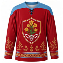 Load image into Gallery viewer, Tynwald Day Original Hockey Jersey in Manx Red, front view with themed artwork and clean crest
