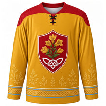 Load image into Gallery viewer, Tynwald Day Original Hockey Jersey in Gorse Gold, front view with themed artwork and clean crest