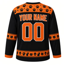 Load image into Gallery viewer, Ugly Halloween Black Cat Curse Hockey Jersey in Midnight Black, back view with a paw print and skull yoke, witch broom sleeve bands, black cat hem band, arched YOUR NAME lettering and 00 – custom name and number
