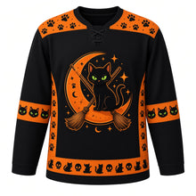 Load image into Gallery viewer, Ugly Halloween Black Cat Curse Hockey Jersey in Midnight Black, front view – midnight black body with an arched hissing black cat with glowing eyes on a crescent moon crest with witch brooms, magic sparkles, tiny cartoon skulls and paw prints, paw print yoke, broom sleeve bands and a black cat hem band – custom name and number