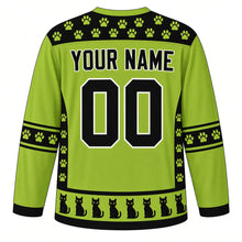 Load image into Gallery viewer, Ugly Halloween Black Cat Curse Hockey Jersey in Poison Green, back view with a paw print and skull yoke, witch broom sleeve bands, black cat hem band, arched YOUR NAME lettering and 00 – custom name and number