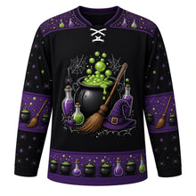 Load image into Gallery viewer, Ugly Halloween Witches Cauldron Hockey Jersey in Midnight Black, front view – midnight black body with purple yoke with a round bubbling witches cauldron crest with green brew, potion bottles, broom, witch hat and spiders, potion yoke, broom and hat sleeve bands and a cauldron hem band – custom name and number