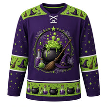 Load image into Gallery viewer, Ugly Halloween Witches Cauldron Hockey Jersey in Witch Purple, front view – witch purple body with poison green yoke with a round bubbling witches cauldron crest with green brew, potion bottles, broom, witch hat and spiders, potion yoke, broom and hat sleeve bands and a cauldron hem band – custom name and number