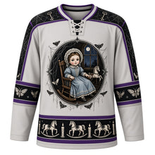Load image into Gallery viewer, Ugly Halloween Haunted Doll Attic Hockey Jersey in Attic Dust Gray, front view – attic dust gray body with black and purple trim with an antique porcelain doll in a lace bonnet in a rocking chair under a moonlit attic window, cobwebs, a rocking horse and moths, cobweb-and-key yoke, spinning-top-and-moth sleeve bands and a rocking-horse hem band – custom name and number
