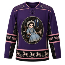 Load image into Gallery viewer, Ugly Halloween Haunted Doll Attic Hockey Jersey in Haunted Purple, front view – haunted purple body with black and dusty rose trim with an antique porcelain doll in a lace bonnet in a rocking chair under a moonlit attic window, cobwebs, a rocking horse and moths, cobweb-and-key yoke, spinning-top-and-moth sleeve bands and a rocking-horse hem band – custom name and number