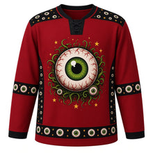 Load image into Gallery viewer, Ugly Halloween Creepy Eyeball Stare Hockey Jersey in Blood Moon Red, front view – blood moon red body with a giant bulging veiny eyeball crest surrounded by many staring eyes peeking from darkness, tentacle-like vines and stars, blinking eye yoke, vine sleeve bands and a staring eyeball hem band – custom name and number