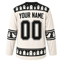 Load image into Gallery viewer, Ugly Halloween Graveyard Ghosts Hockey Jersey in Bone White, back view with a ghost and tombstone yoke, ghost and bat sleeve bands, tombstone hem band, arched YOUR NAME lettering and 00 – custom name and number