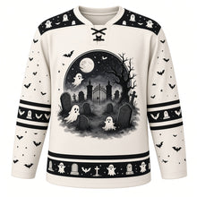 Load image into Gallery viewer, Ugly Halloween Graveyard Ghosts Hockey Jersey in Bone White, front view – bone white body with black yoke with a round moonlit graveyard crest of floating ghosts, tombstones, bare tree and bats, ghost yoke, ghost and bat sleeve bands and a tombstone hem band – custom name and number