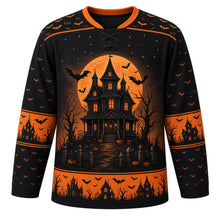 Load image into Gallery viewer, Ugly Halloween Haunted House Hill Hockey Jersey in Midnight Black, front view – midnight black body with a haunted Victorian house on a hill crest with glowing windows, creepy eyes, full moon, bats and dead trees, bat yoke, haunted house sleeve bands and a glowing window hem band – custom name and number