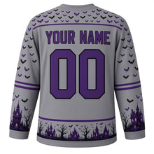 Load image into Gallery viewer, Ugly Halloween Haunted House Hill Hockey Jersey in Graveyard Gray, back view with a bat and moon yoke, haunted house sleeve bands, glowing window hem band, arched YOUR NAME lettering and 00 – custom name and number