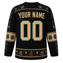 Load image into Gallery viewer, Ugly Halloween Mummy Tomb Crawl Hockey Jersey in Midnight Black, back view with a hieroglyph-style yoke, bandage-stripe sleeve bands, scarab hem band, arched YOUR NAME lettering and 00 – custom name and number