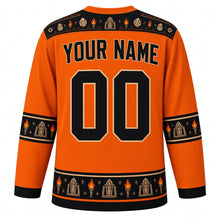 Load image into Gallery viewer, Ugly Halloween Mummy Tomb Crawl Hockey Jersey in Pumpkin Orange, back view with a hieroglyph-style yoke, bandage-stripe sleeve bands, scarab hem band, arched YOUR NAME lettering and 00 – custom name and number
