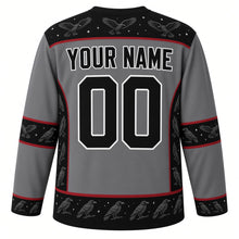 Load image into Gallery viewer, Ugly Halloween Midnight Raven Roost Hockey Jersey in Graveyard Gray, back view with a crow-flock yoke, feather-chevron sleeve bands, tree-silhouette hem band, arched YOUR NAME lettering and 00 – custom name and number