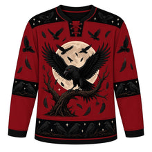 Load image into Gallery viewer, Ugly Halloween Midnight Raven Roost Hockey Jersey in Blood Moon Red, front view – blood moon red body with black yoke with a red-eyed raven with spread wings on a gnarled branch before a full moon, a flock of crows and crooked trees, crow-flock yoke, feather sleeve bands and a tree-silhouette hem band – custom name and number