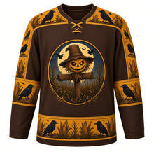 Load image into Gallery viewer, Ugly Halloween Scarecrow Cornfield Fright Hockey Jersey in Cornstalk Brown, front view – cornstalk brown body with a grinning stitched-burlap scarecrow crest with glowing eyes in a moonlit cornfield with circling crows, corn and crow yoke, corn cob sleeve bands and a cornstalk hem band – custom name and number