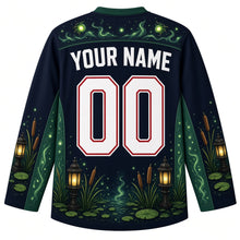 Load image into Gallery viewer, Ugly Halloween Will-o-Wisp Bog Lanterns Hockey Jersey in Midnight Black, back view with a lantern and wisp yoke, lantern and cattail sleeve bands, lantern-post hem band, arched YOUR NAME lettering and 00 – custom name and number