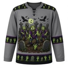 Load image into Gallery viewer, Ugly Halloween Zombie Shuffle Hockey Jersey in Graveyard Gray, front view – graveyard gray body with black yoke with goofy cartoon zombies shuffling from cracked earth with rising hands, tombstones and crows, zombie-hand yoke, zombie-hand sleeve bands and a tombstone hem band – custom name and number